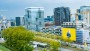 Reusachtig kunstwerk van Joseph Klibansky op gebouw Amsterdamse Zuidas